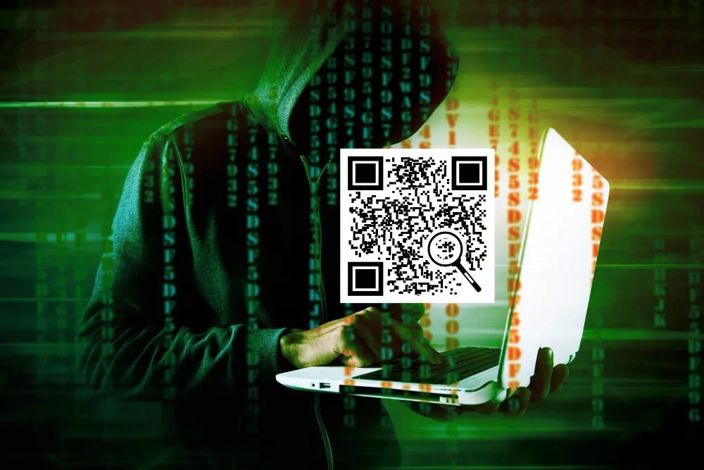 Qr code hacker with laptop
